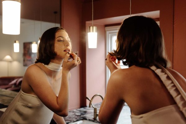 women getting ready for her wedding at miss midgleys apartments in brisbane